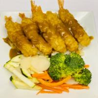 Shrimp Tempura Curry Bowl · 5 pieces tempura shrimp & steamed veggies over steamed rice, topped with Japanese curry sauc...