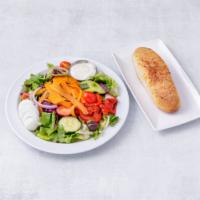 Garden Salad · Romaine, egg, tomatoes, red onions, carrots, cucumbers, olives, roasted peppers and red cabb...