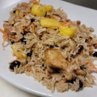Thai Pineapple Shrimp Fried Rice · Stir-fried in a wok with shrimp, mixed vegetables, fresh pineapple, raisins, and peanuts.