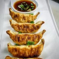Pan Seared Dumplings · 5 pieces. Pork and vegetables dumplings served with homemade citrus soy sauce.