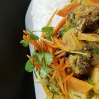 Oxtail Curry Rice Bowl · Slightly spicy, creamy and flavorful curry made with coconut cream, seasoned vegetables over...