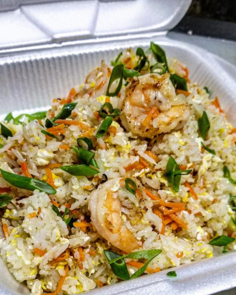 Shrimp Fried Rice · Thai Jasmine rice wok tossed with fresh vegetables , egg and your choice of meats. Topped with green onions 