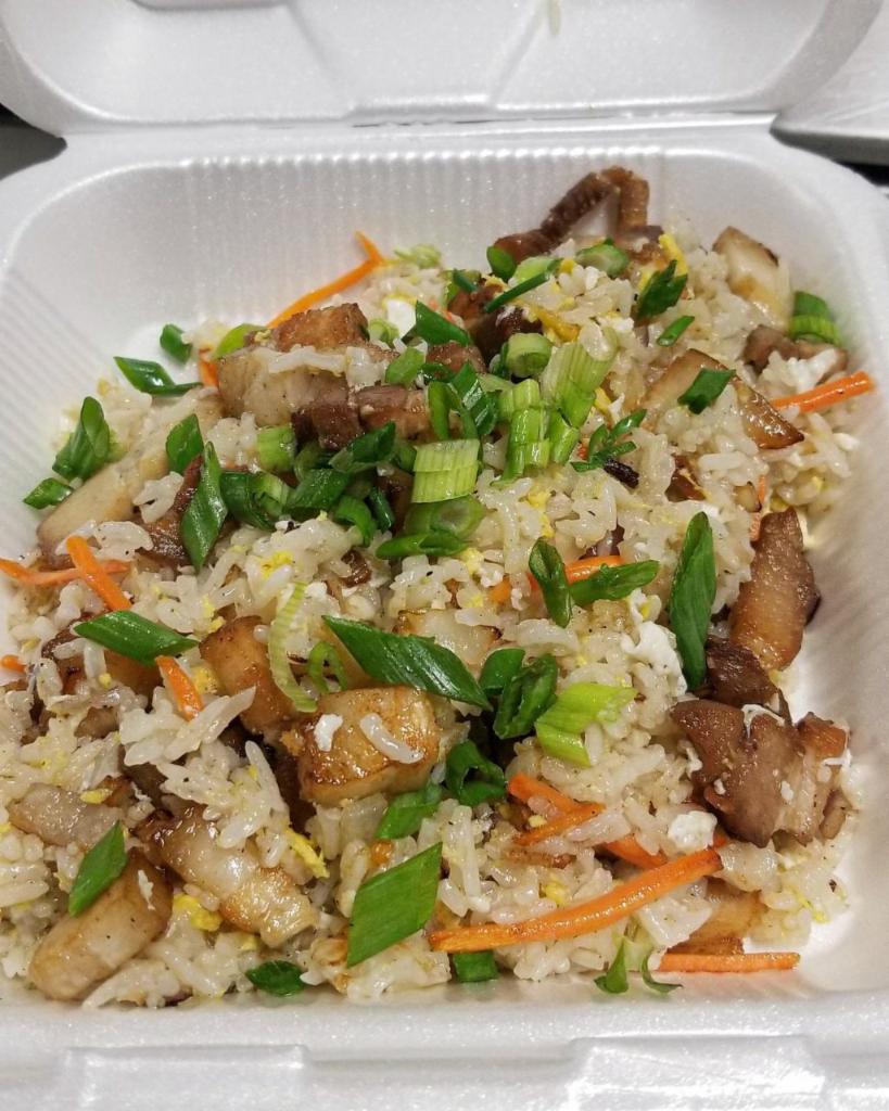 Porkbelly Fried Rice · Thai Jasmine rice wok tossed with fresh vegetables , egg and your choice of meats. Topped with green onions 