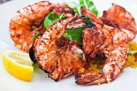 Shrimp Tandoori · Finest jumbo shrimp on onion bed in sizzler.