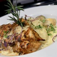 Rosemary Chicken · Chicken breast, pan seared to perfection over mashed potatoes topped with rosemary creamy sa...