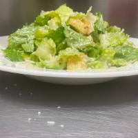 Caesar Salad · Romaine, Parmesan, creamy Caesar, and crouton.
