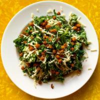 Tandoori Kale Caesar Salad · Kale, house-made vegan Caesar, tandoori chickpeas, and vegan cheese. Vegan. Gluten-free.
