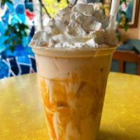 Caramel Spiced Chai · Caramel, chai, whipped cream, and cinnamon stick.
