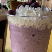 Blueberry Cheesecake · Blueberry shake flavored with cheesecake flavoring, frozen blueberries, whipped cream, and g...