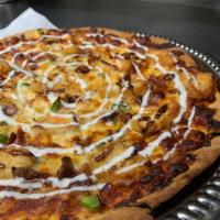 BBQ Chicken Pizza · grilled chicken, house made bbq sauce, red onions, pickled jalapeños