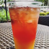 Tropical Punch · Mango and passionfruit tea, pineapple juice, seltzer, and pomegranate lime.
