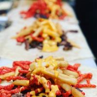 Hot Cheeto Burrito · Carne Asada, Nacho Cheese, Fries & Hot Cheetos