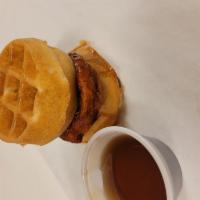 Hot waffle chicken sliders  · 3 hot chicken sliders on belgium style waffles served with maple syrup 