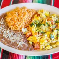 Huevos Mexicanos · Eggs scrambled with fresh tomatoes, onions, and jalapenos. Served with rice, beans, and corn...