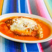 Chile Relleno with Sauce and Cheese · Anaheim Chile stuffed with monterey jack cheese drenched in egg batter fried to perfection! ...