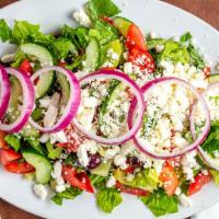 Mediterranean Salad · Romaine lettuce topped with cucumber, tomato, red onion, feta cheese and kalamata olives tos...