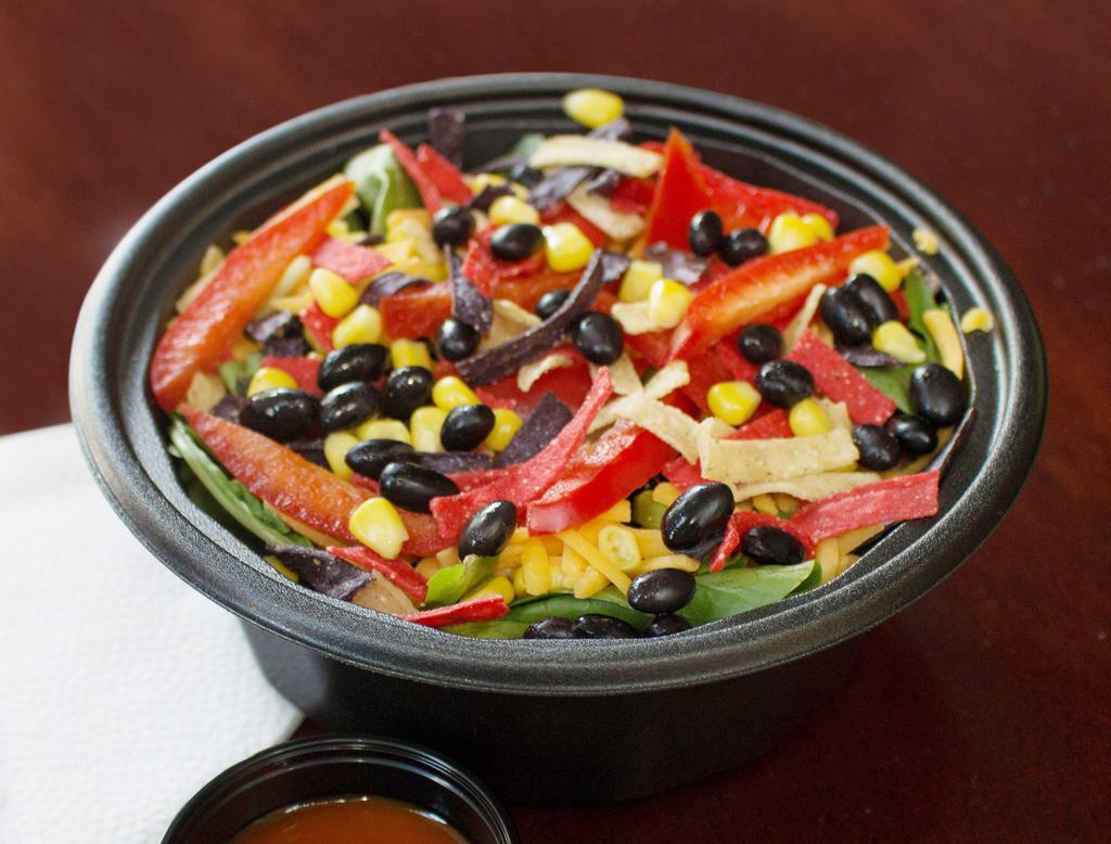 Southwest Salad · Comes with romaine lettuce, black beans, corn, red bell peppers, cheddar, and tortilla chips served with southwest dressing.