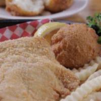 Fish and Chips Basket · 1 piece of original hand breaded cod, served with french fries and a hush puppy.