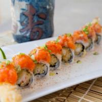 New York Roll · Two jumbo shrimp, deep fried with spicy salmon an spicy yellowtail on top. Spicy.
