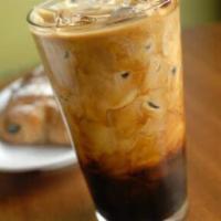 Thai Iced Coffee · A rich Thai coffee brewed to perfection. Sweet and creamy, the perfect pick-me up.