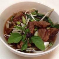 *special* Beef noodle soup · Noodle soup with sliced beef and meatballs. Fresh basil, bean sprouts and cilantro with a cr...