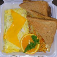 Ham and Cheese Omelet · A 3 extra-large egg omelet filled with chopped ham, cheddar cheese and topped with American ...