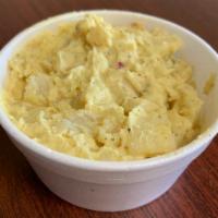 Potato Salad · Potatoes, Mayo, Red Bell Peppers, Mustard, Dill Pickle, Celery, and Red Onions.