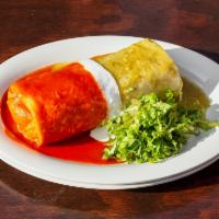 Best Burrito · Yucatan style pork pibil, rice, avocado, cheddar jack cheese,lime cilantro crema, and pinto ...