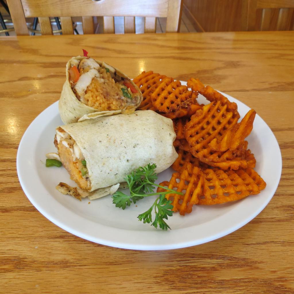Santé Fe Grilled Chicken Wrap · Grilled Chicken, sautéed bell peppers & onions, re-fried rice, pinto beans, your choice of wrap and a lunch side.