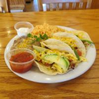 Breakfast Tacos · Scrambled eggs with onions, tomatoes & cheese. Top with avocado slices on soft corn tortilla...
