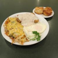 Country Fried Steak and Eggs · Served with toast and a breakfast side.