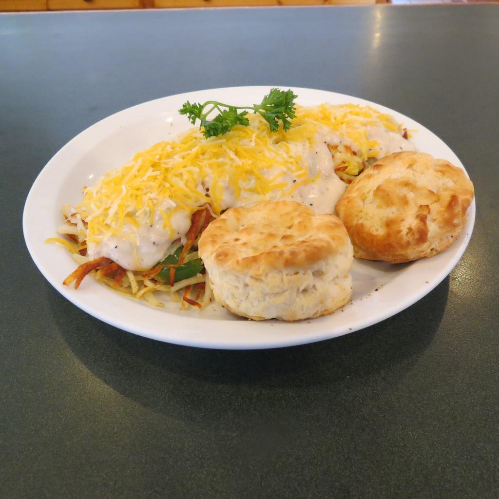 Breakfast Lasagna  · A magnificent tower starting with a base of hashbrowns stacked with cheese, scrambled eggs, sausage, bell  peppers, onions, and yet another layer of hashbrowns with cheese, all doused with our savory, homemade sausage gravy.