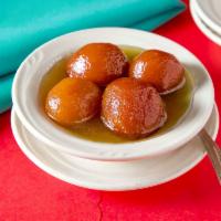 Gulab Jamun · 2 pieces. Dry milk and homemade cheese balls, deep fried, in a light syrup and rose water. S...