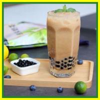 Honeydew Bubble Milk Tea 哈密瓜 · This drink is  shaken with non-dairy milk along with with fresh green tea.