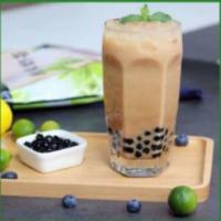 Kiwi Bubble Milk Tea 猕猴桃 · This drink is  shaken with non-dairy milk along with with fresh green tea.