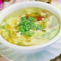 Egg Drop Soup 鸡蛋汤 · This dish is made of egg, tomato, cucumber.