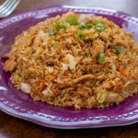 Chicken Fried Rice 鸡肉炒饭 · this is a dish of cooked rice that has been stir-fried in a wok or a frying pan and is usual...