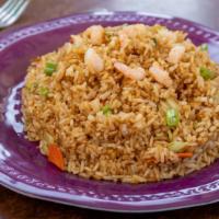 Shrimp Fried Rice 虾肉炒饭 · this is a dish of cooked rice that has been stir-fried in a wok or a frying pan and is mixed...