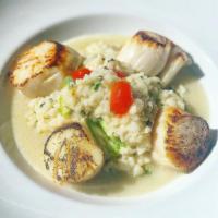 Pan Seared Scallops · Asparagus and roasted tomato risotto and lemon butter sauce. Gluten free.