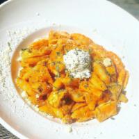 Chicken Cavatelli · Grilled chicken, Parmesan, fresh herbs, creamy plum tomato sauce and herb ricotta.