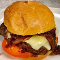 Smokehouse Burger · Aged white cheddar, bacon onion jam, tomato and Applewood smoked bacon.