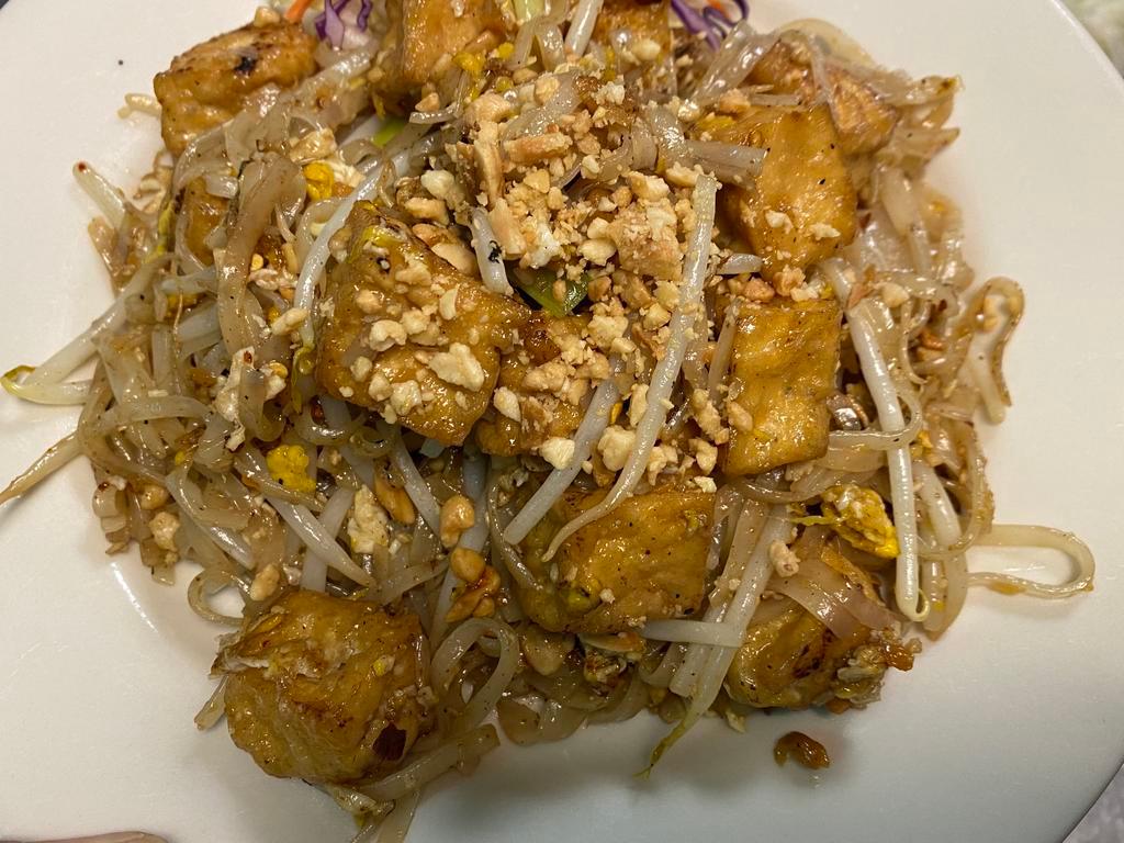 PT3. Spicy Tofu Pad Thai · Stir-fried fresh rice noodles with tofu, bean sprouts, egg, scallion and ground peanuts.