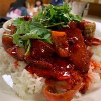 H3. Kao Moo Dang · Thin sliced roast pork, crispy pork, sweet sausage and hard boiled egg on rice. Covered with...