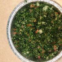 Tabouleh · Parsley, tomato, onions, burghul, lemon juice and olive oil.
