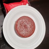 Choco pie. · A choco pie is a snack cake consisting of two small round layers of cake with marshmallow fi...