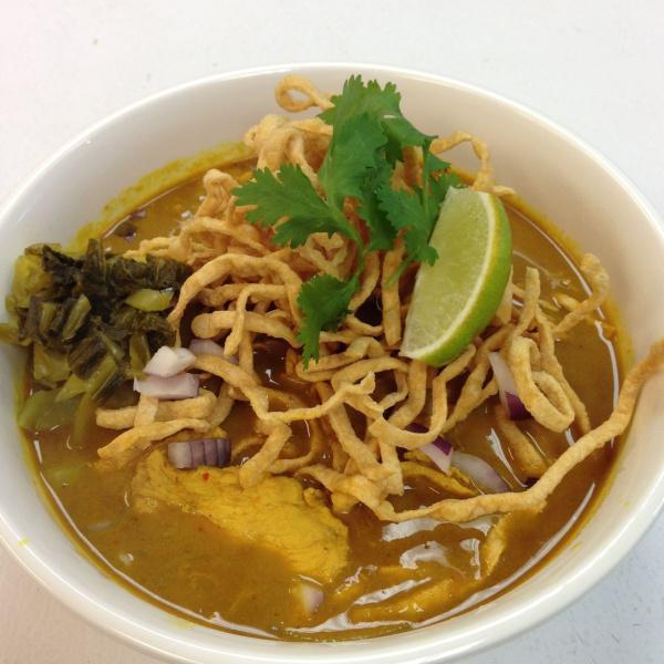 Khao Soi Kai · Chicken curry noodle soup. Eggs noodle and bean sprout. Hot and spicy.
