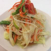Som Tum Salad · Shredded green papaya, carrot, tomatoes, string beans and peanuts with lime dressing.