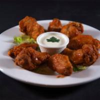 Di Bufala Wings · 8 pieces. Homemade jumbo chicken wings tossed with your choice of sauce and served with ranc...