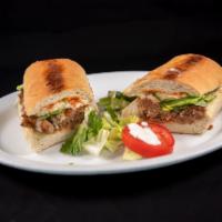 Meatball Sandwich · Ground beef, pork, meatballs, mozzarella, tomatoes, and lettuce. 