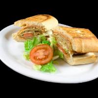 Vegetarian Sandwich · Baked sandwich with sauteed onions, tomatoes, bell peppers, mushrooms with mozzarella cheese...